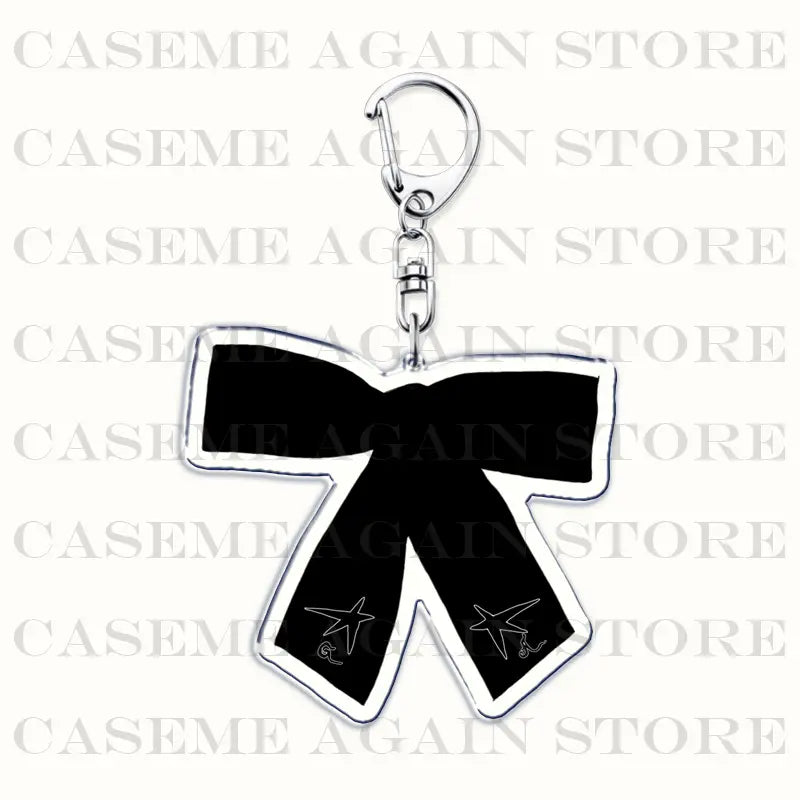 Black bow-shaped acrylic keychain with silver metallic outline and carabiner clip ideal as Gracie Abrams anime fan gift