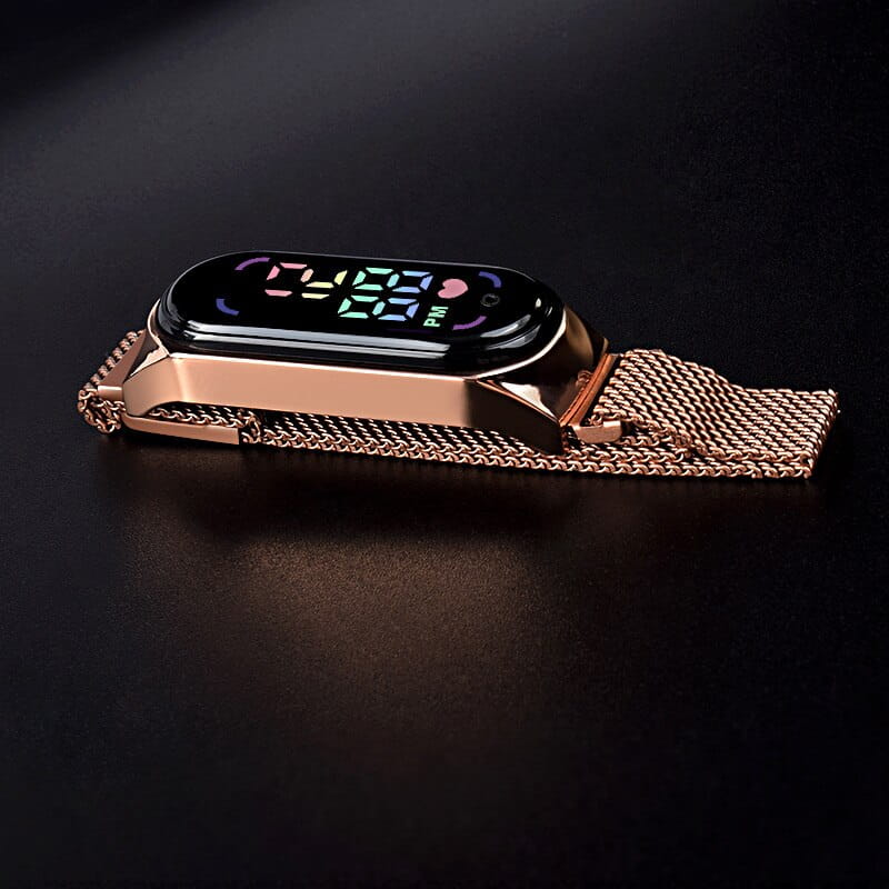 Rose gold digital watch with a mesh band and a sleek rectangular face displaying time in vibrant led colors designed for touch control and waterproof use.