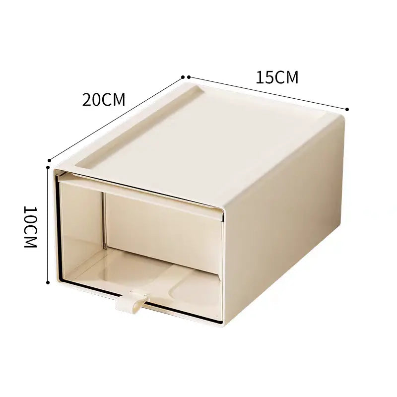 Cream-colored rectangular plastic desktop organizer and collectible display case with a smooth matte finish and black trim along the edges.