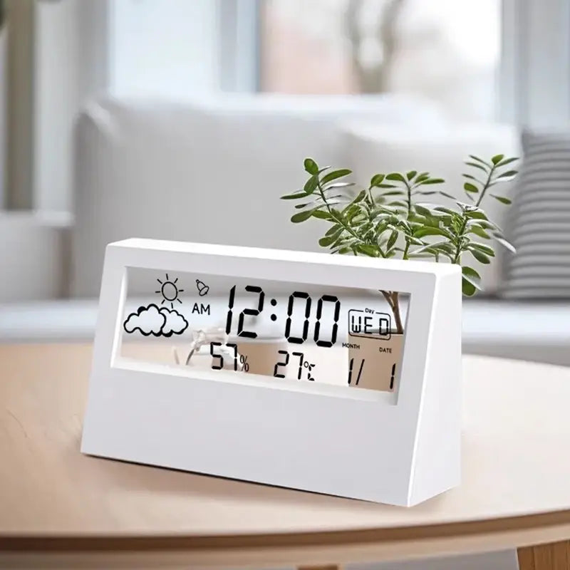 white rectangular digital weather desktop alarm clock with a sleek minimalist design displaying time date weather icons and temperature on its screen