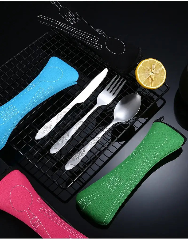 Portable travel cutlery set with stainless steel cutlery engraved with floral patterns and colorful silicone utensil holders in blue green and pink.