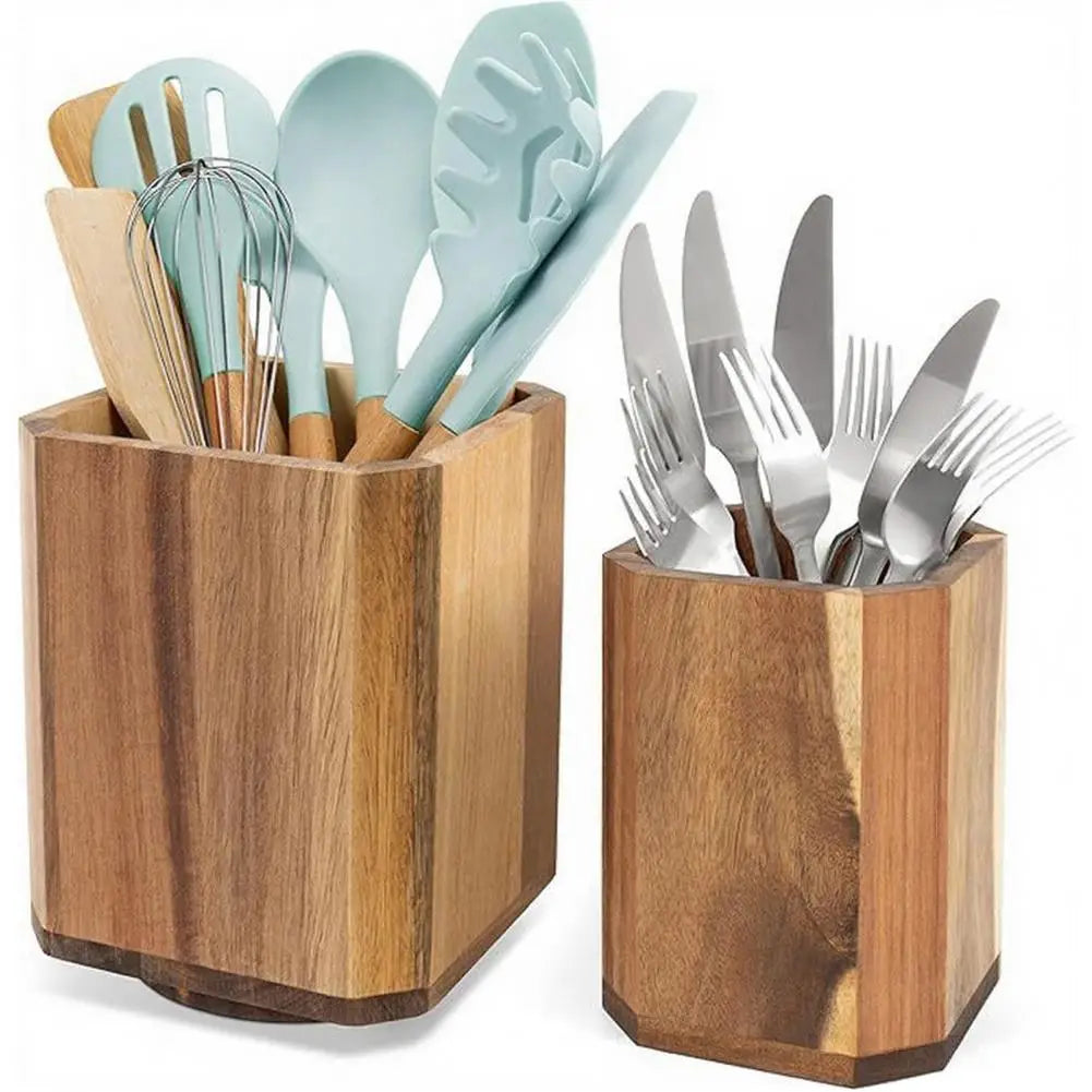 Two hexagonal wooden rotating kitchen utensil holders on a countertop, one containing light blue silicone and wood-handled tools and the other holding stainless steel cutlery.