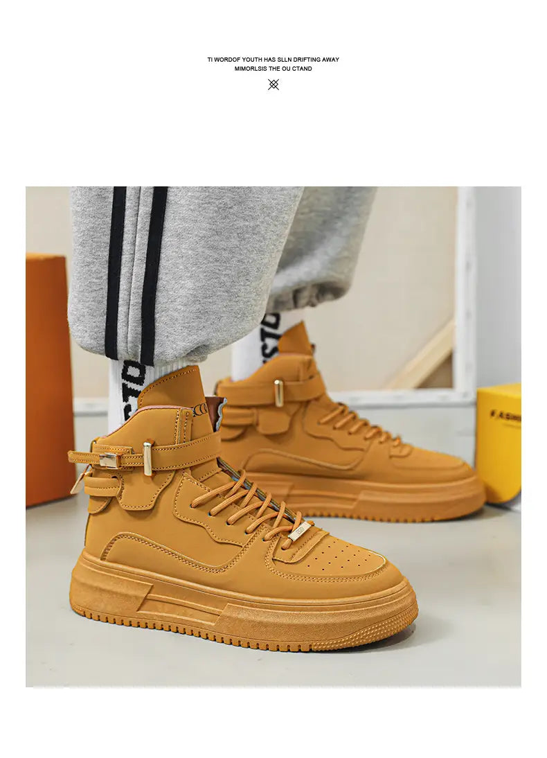 Men white high top sneakers featuring a chunky sole and gold buckle accents in tan leather.
