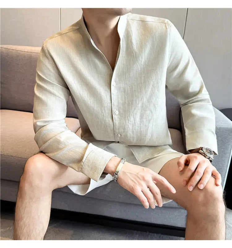 Men’s beige linen button-down shirt with subtle texture and classic collar suitable for casual and formal wear.