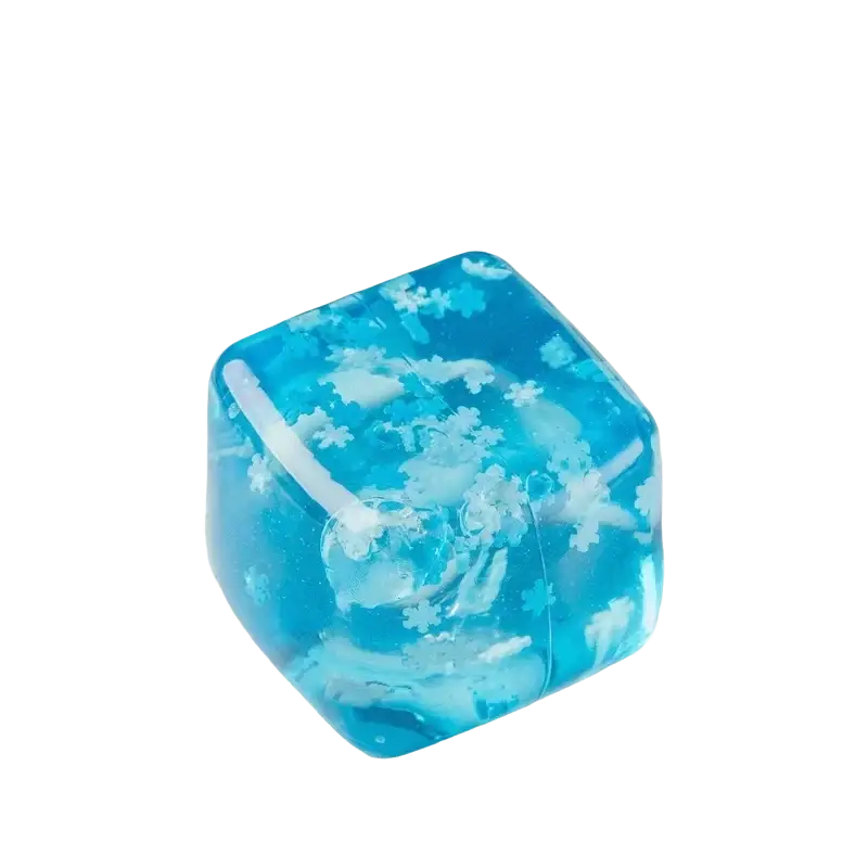 A translucent blue cube-shaped snowflake ice cube stress relief toy with white snowflake patterns viewed from the front