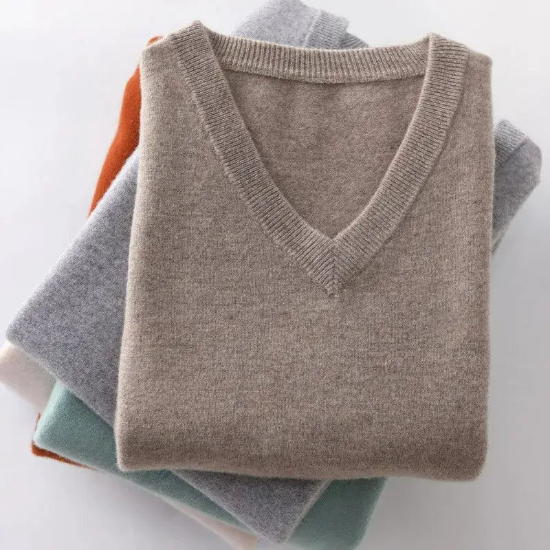 men cashmere v neck pullover sweater in soft beige featuring a ribbed collar and cuffs made from fine-knit cashmere.