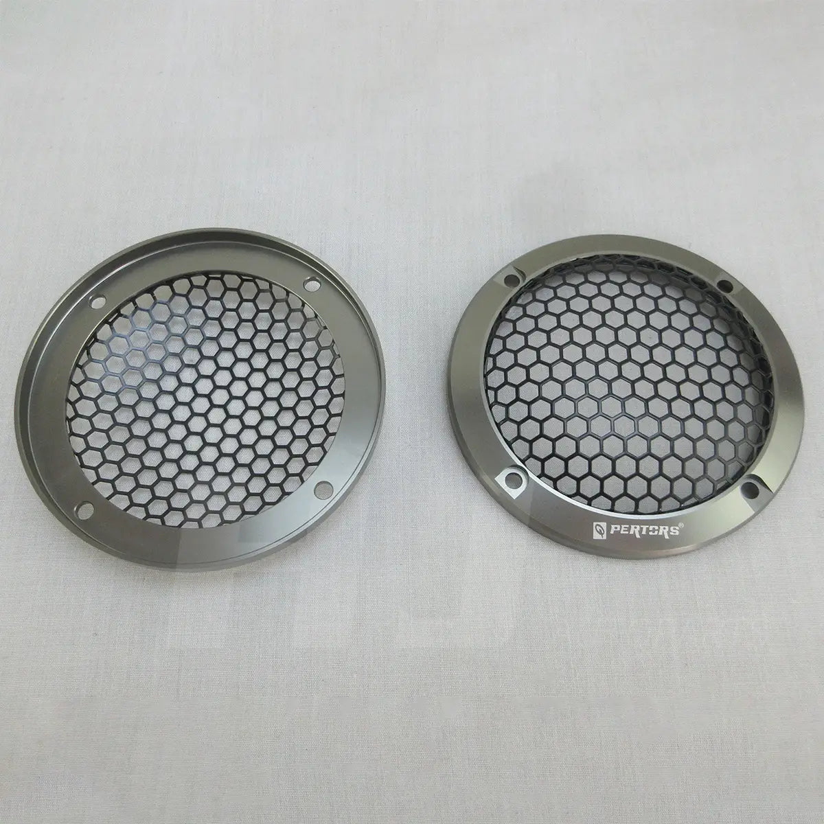 Silver hexagonal mesh speaker grilles with a sleek metallic finish and pertsrs branding for 3.5 inch car coaxial speakers 200w qp353f.