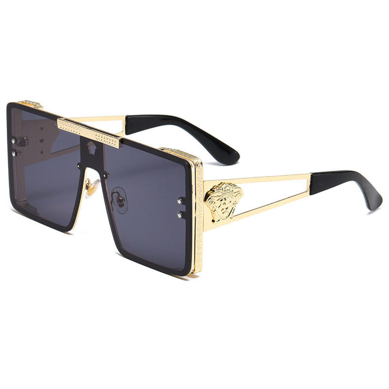 Gold-framed polarized oversized metal sunglasses for adults with black lenses and a Medusa head emblem on the temple.