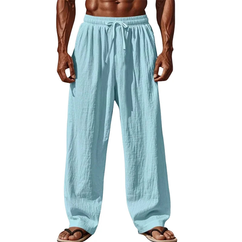 light blue loose-fitting cotton linen casual pants with a drawstring waist and straight leg cut for men