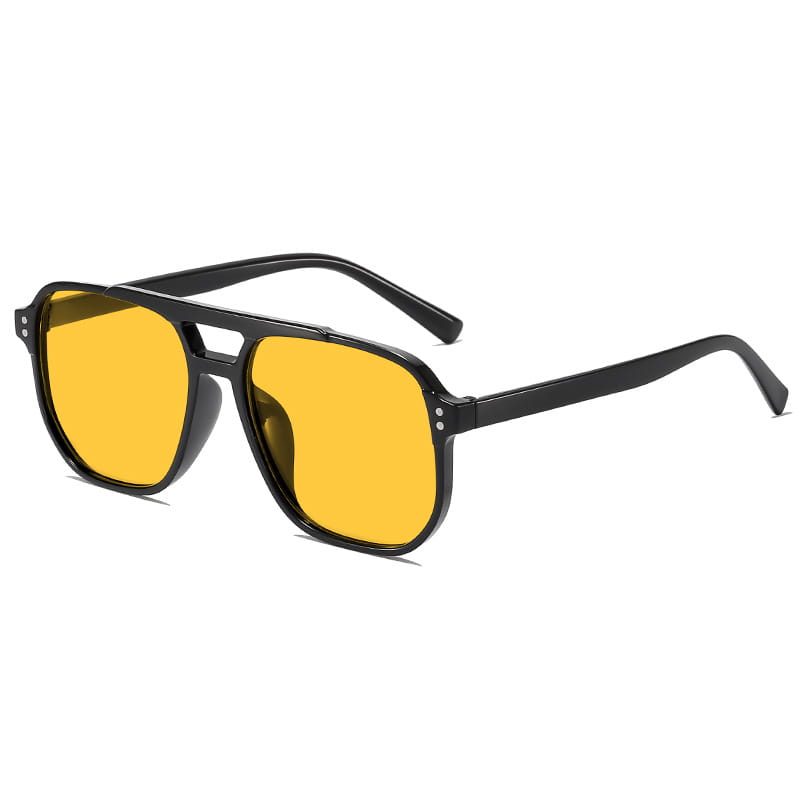 Gafas de sol cuadradas negras con monturas aviador negras y lentes UV400 vibrantes de color amarillo para uso unisex.