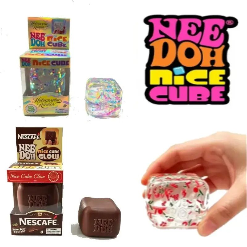 Ein transparentes Kunststoff-Needoh-Nice-Cube-Sensory-Fidget-Spielzeug in Form eines Würfels, verziert mit farbigem Glitzer und roten Kirschmustern.