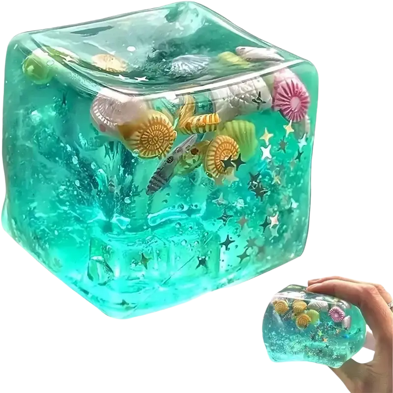 A translucent turquoise swim ocean maltose squishy cube filled with colorful seashells and glittery stars viewed frontally