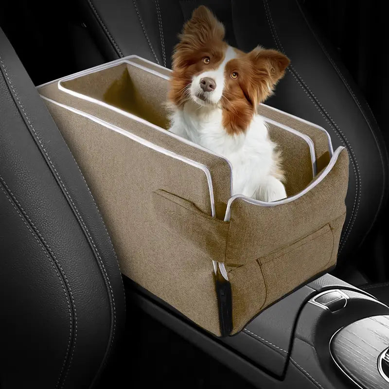 beige fabric pet car console seat with white stitching and two front pockets designed to safely hold small pets up to weight limit of 5kg