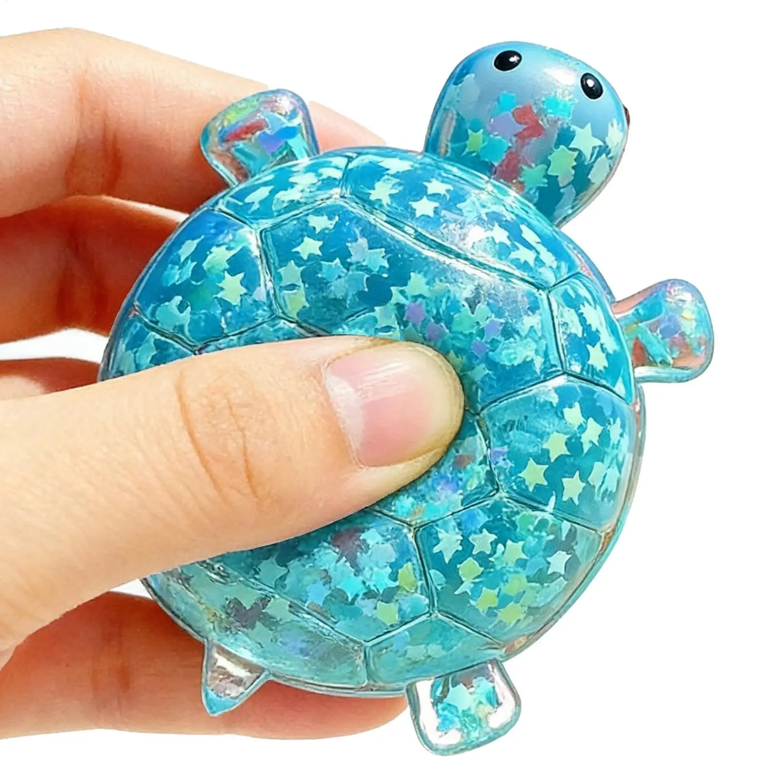 A translucent blue turtle shape squeeze toy filled with sparkling star confetti for sensory stress relief