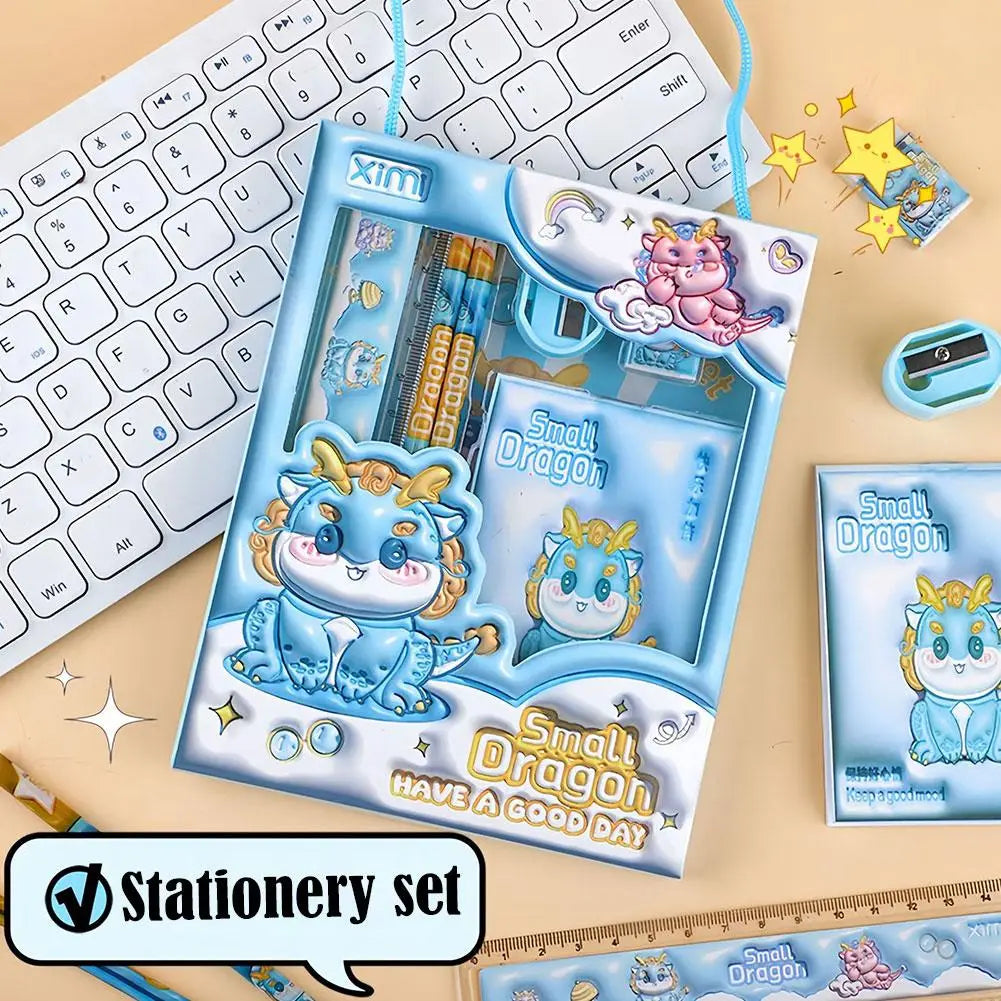 blue small dragon themed space theme cartoon kids stationery set featuring cartoon dragon characters on packaging and contents for children.
