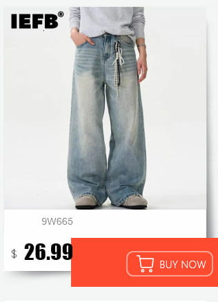 Iefb camouflage wide leg denim jeans featuring a faded blue wash and a drawstring waistband made of denim material.