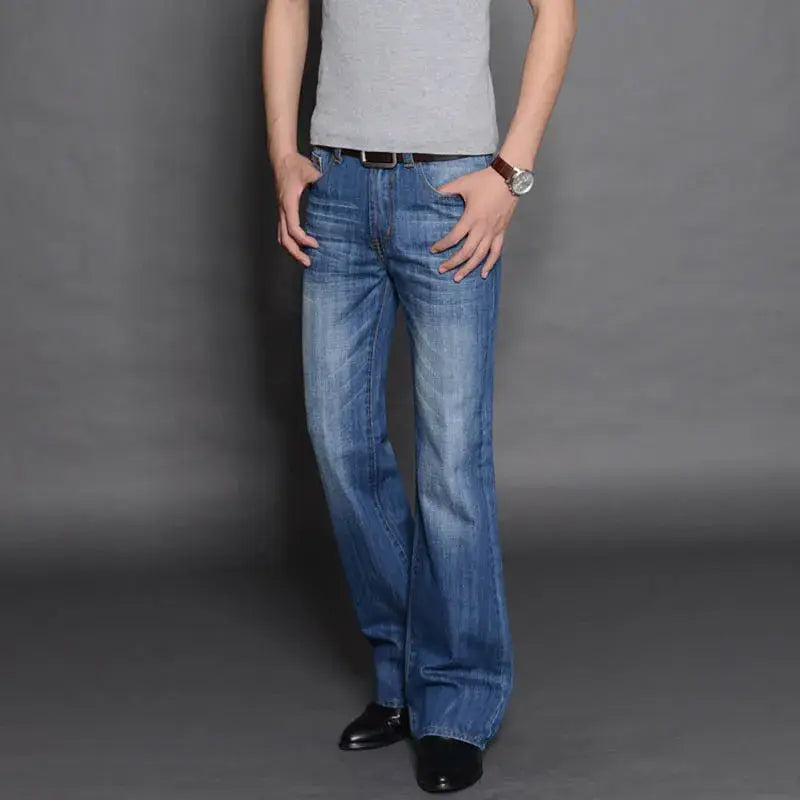 Men’s flared denim jeans in blue faded wash with a classic straight-leg cut made from durable denim for casual wear.