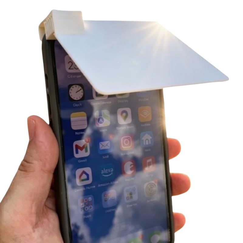 weißer Kunststoff-Sonnenschutz für das Displayschutzglas des Smartphones, ausgelegt als Anti-Blend-Plattenabdeckung zur wirksamen Bereitstellung von Schutz vor der Sonne für das Telefon.