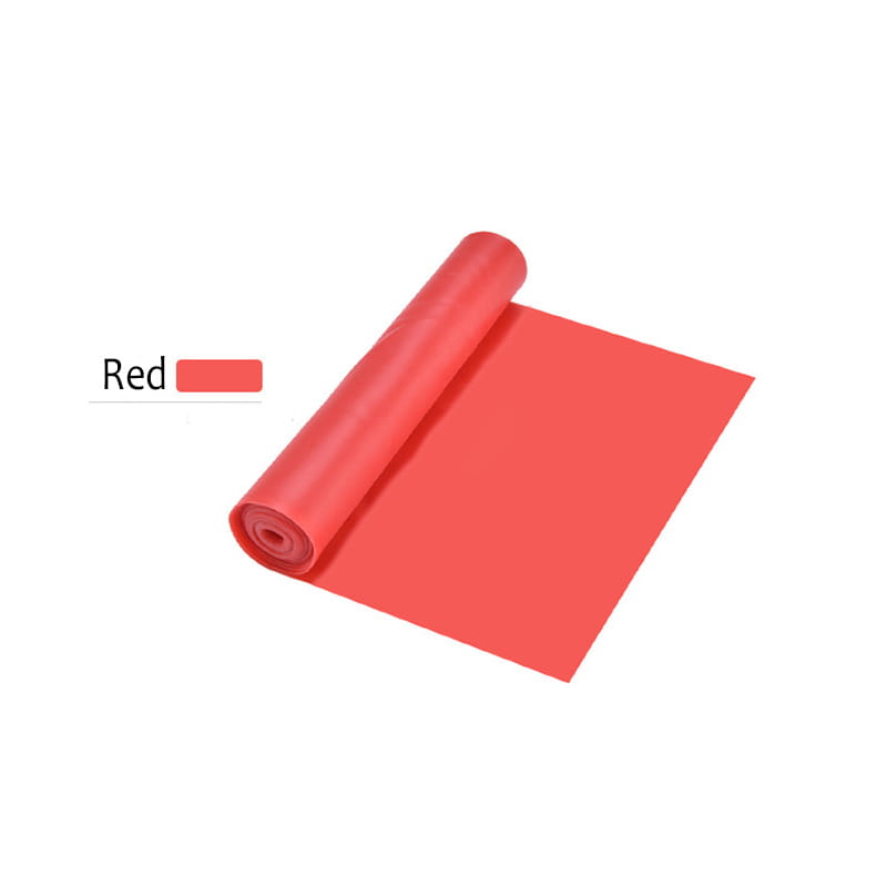 red rubber resistance workout band for home fitness rolled and partially unrolled to display its smooth texture