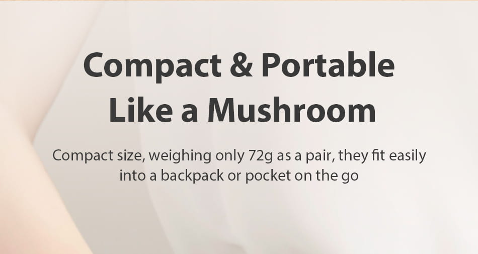 compact and portable mushroom-shaped earbuds weighing 72g paired with rocaren magnetic laptop stand and cooling holder for efficient device support and ventilation.