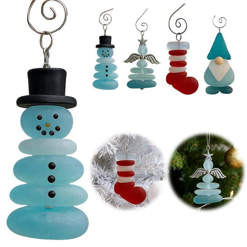 A charming light blue sea glass snowman christmas ornament with a black top hat and button eyes designed as a christmas coastal tree decoration.