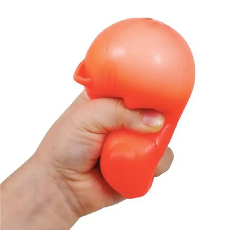 A vibrant orange squishy sensory fidget cat and dog toy with a smooth glossy surface and quick rebound ergonomic design shown from the front.