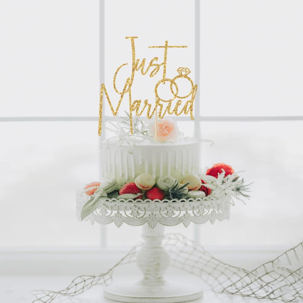 Just married gold glitter cake topper featuring a ring design ideal for wedding cake decoration.