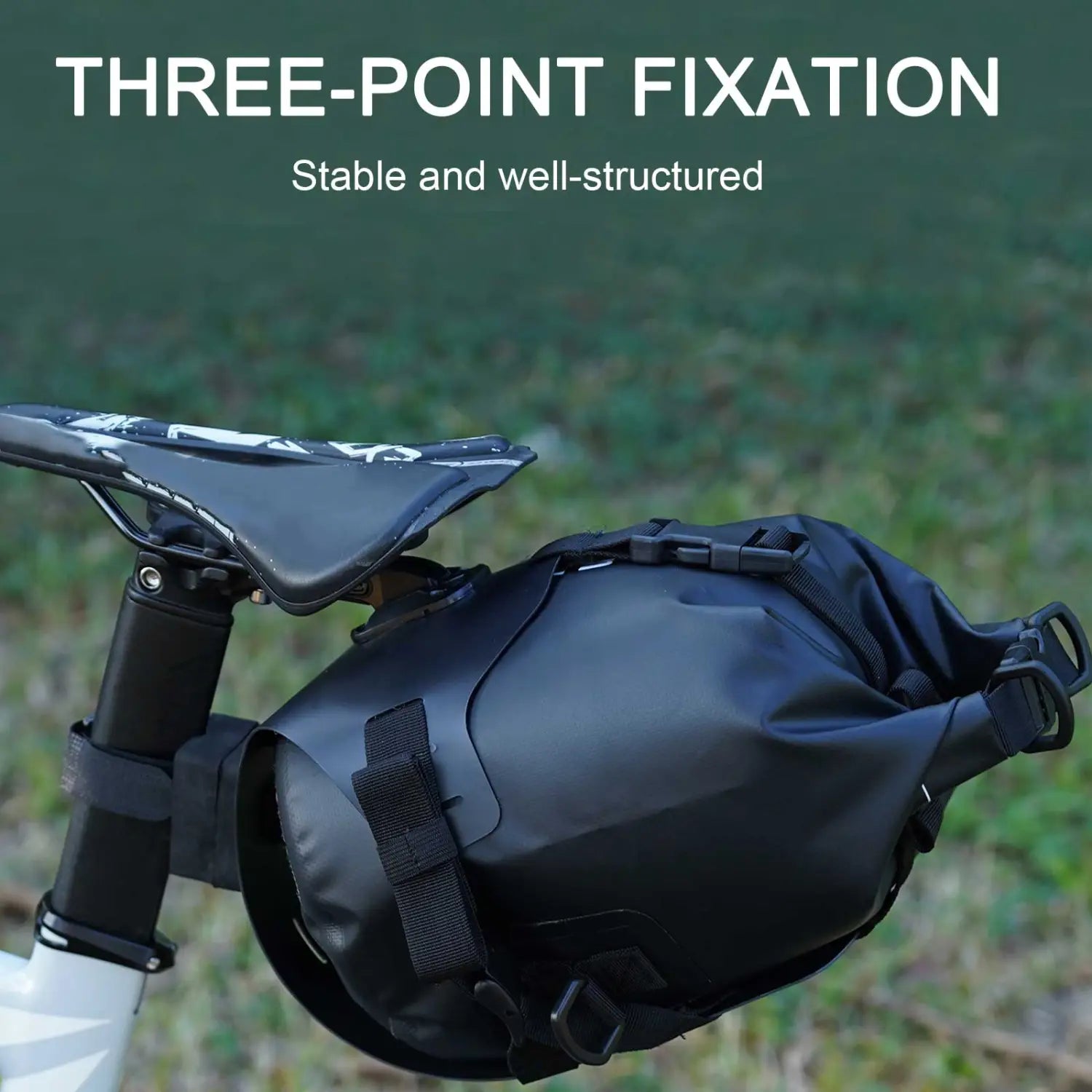 Black waterproof bike saddle bag with three-point fixation system shown from the back side for secure carrying stability.