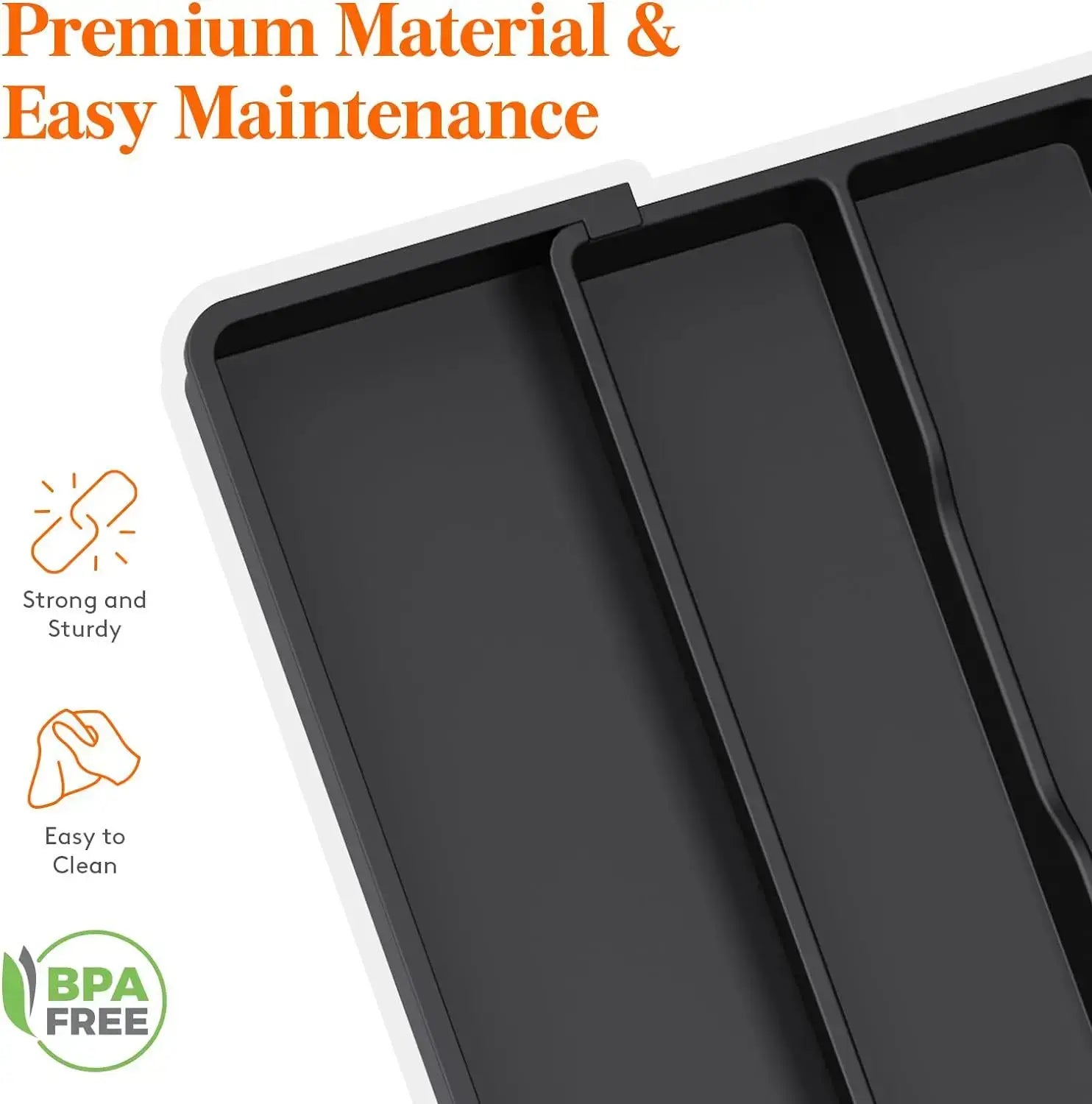 Organizador de cajón expandible para cubiertos de plástico negro con tres compartimentos para el almacenamiento de utensilios.