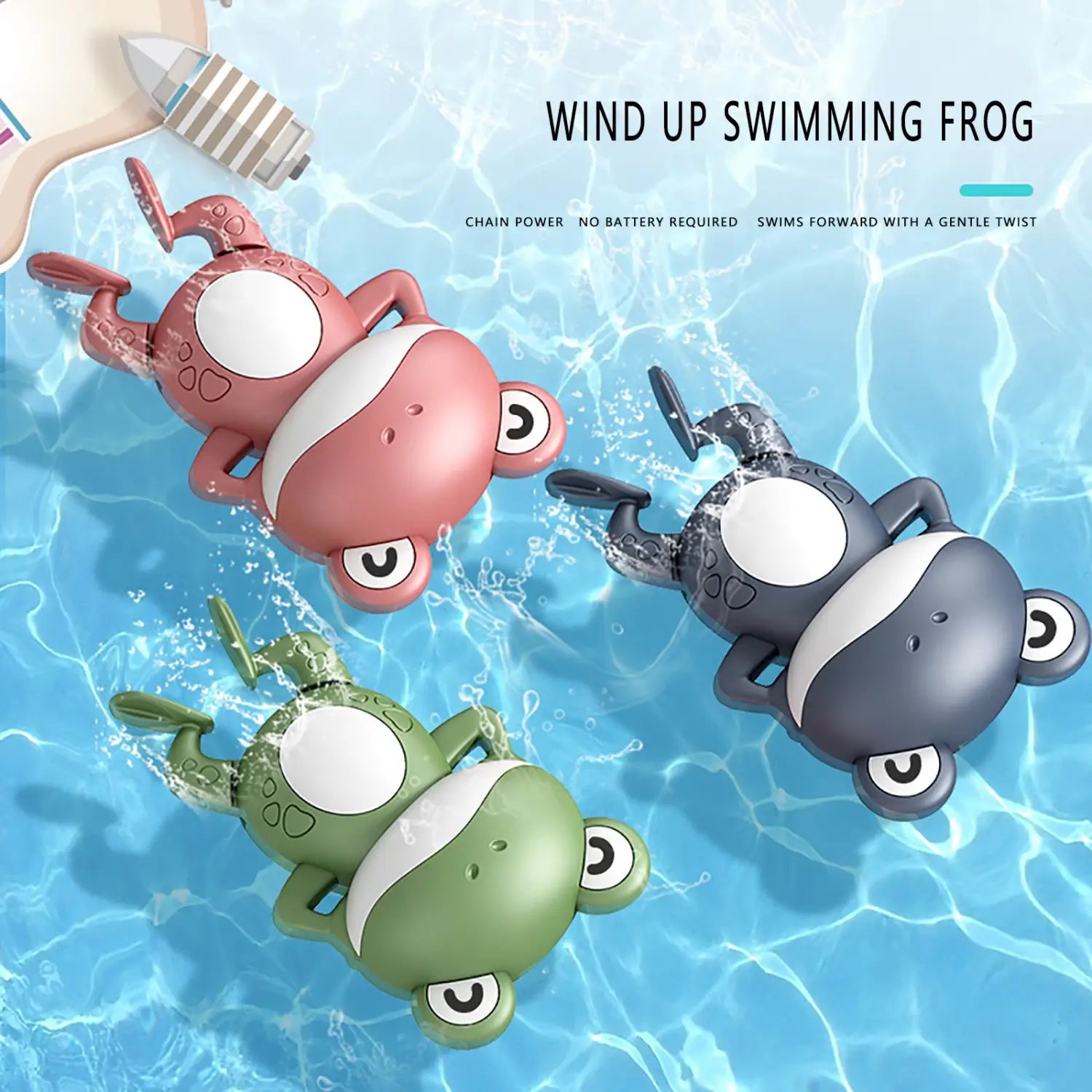 Aufzieh-Frosch-Badespielzeug aus pinkem, grünem und grauem Kunststoff mit weißen Augen und Bauchstreifen, ausgelegt zum Schwimmen im Wasser