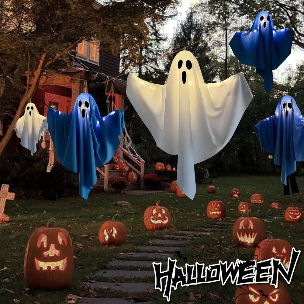 white and blue glowing halloween ghost pathway lights hanging outdoors as plug in ghost lights for outdoor decor.