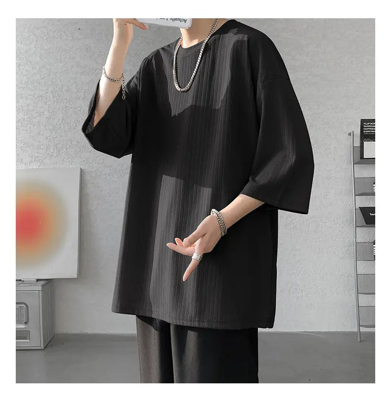 Black textured cotton men striped oversized summer t-shirt with three-quarter sleeves.