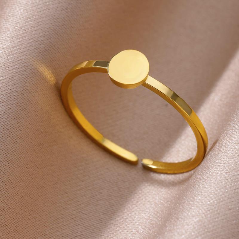 Gold color stainless steel adjustable ring with a smooth circular flat disc top designed for women vintage wedding jewelry.
