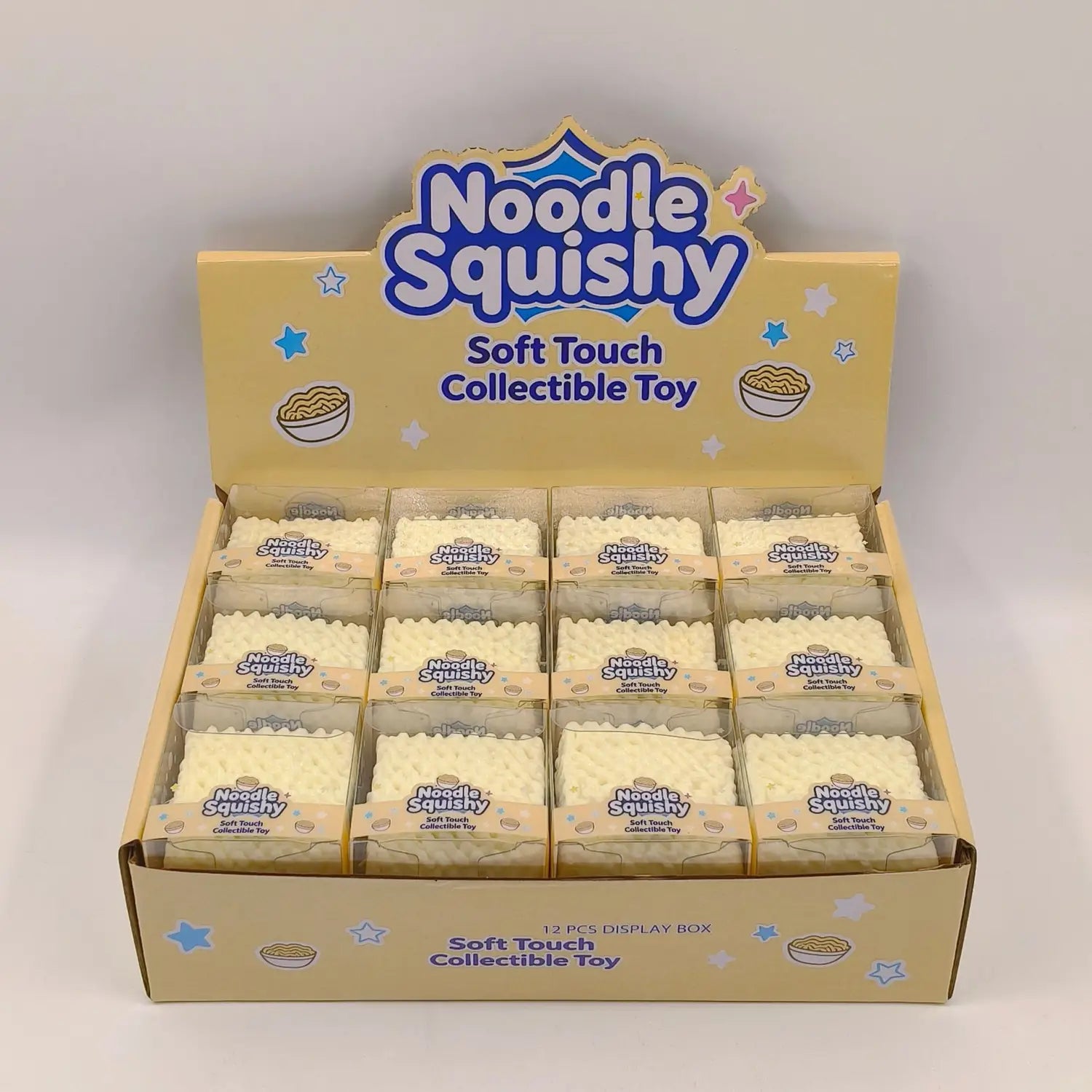 A beige noodle-shaped squishy toy made of soft material in clear plastic packaging with noodle squishy branding designed for stress relief and building block play.