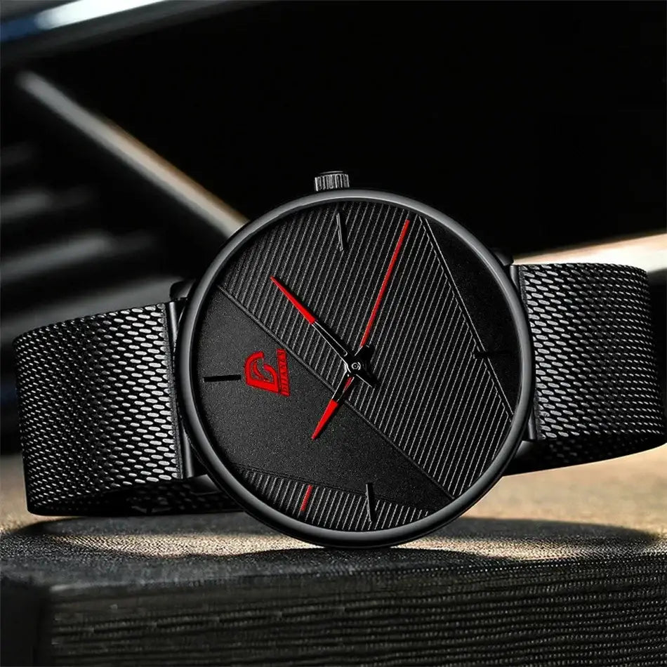 Herrenarmbanduhr aus schwarzem Mesh, Quarz, mit elegantem modernem Design: rote Zeiger und ein dezentes rotes Logo auf dem Zifferblatt.