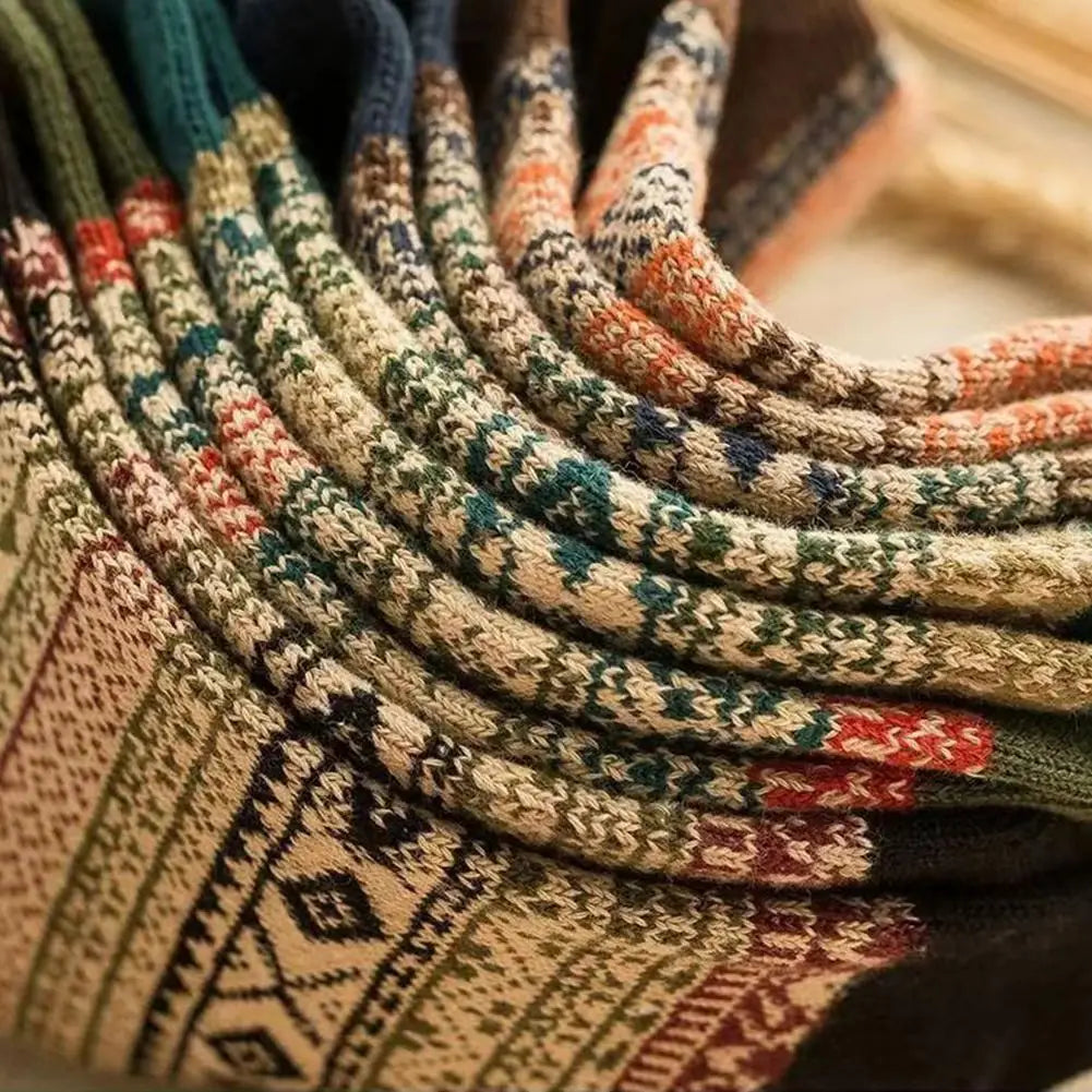 a cozy knitted men retro cotton crew sock in mid-high tube style with a warm beige base and intricate geometric patterns in earthy tones, suitable for fashion trend and thermal comfort.