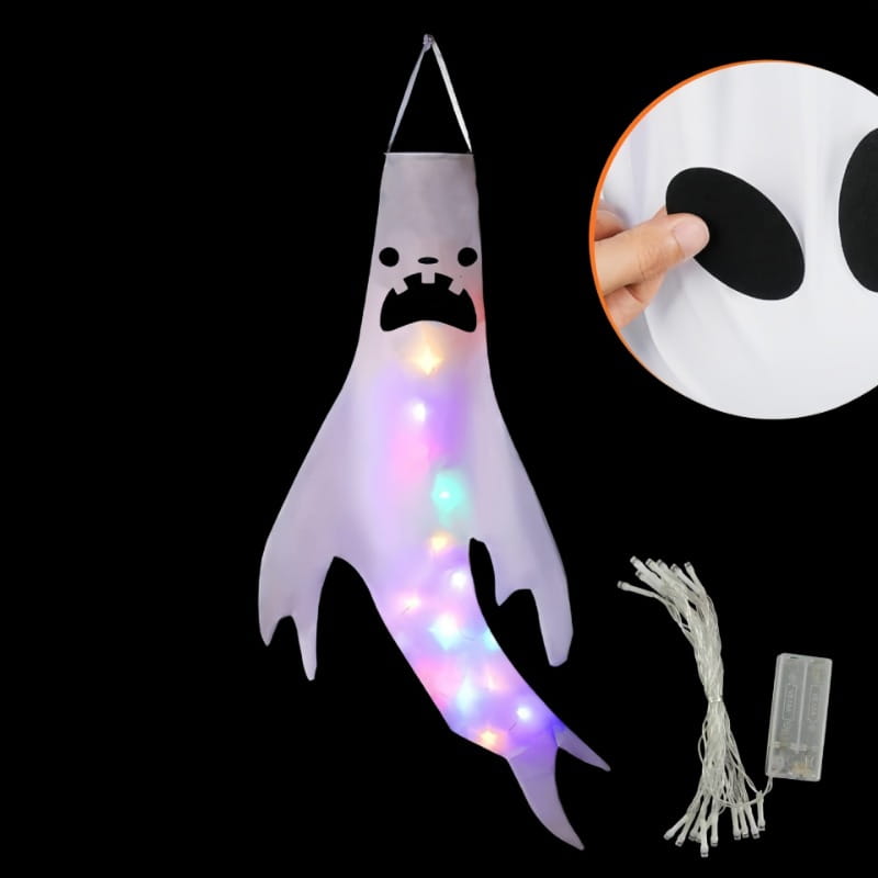 a translucent white halloween ghost led hanging windsock with glowing multicolored lights and a black cutout face designed for home outdoor decoration