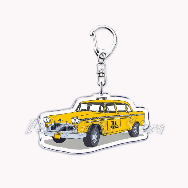 Yellow vintage taxi keychain with clear acrylic body and silver metal clasp from the Nissan Skyline acrylic car keychain collection.