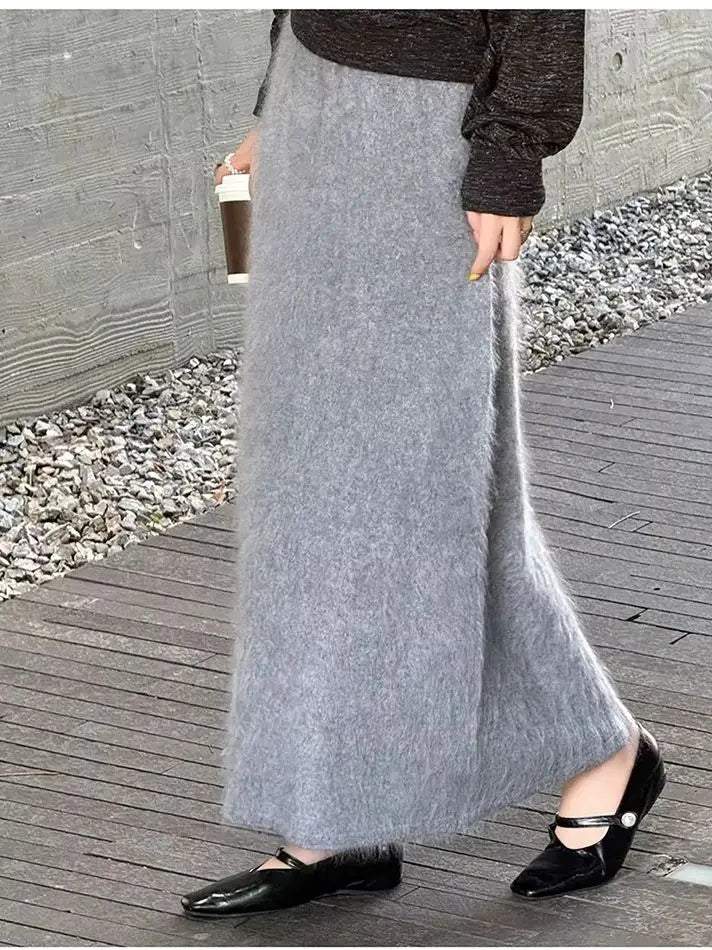 A soft light gray fuzzy mohair wool a-line maxi skirt with a textured knit fabric.