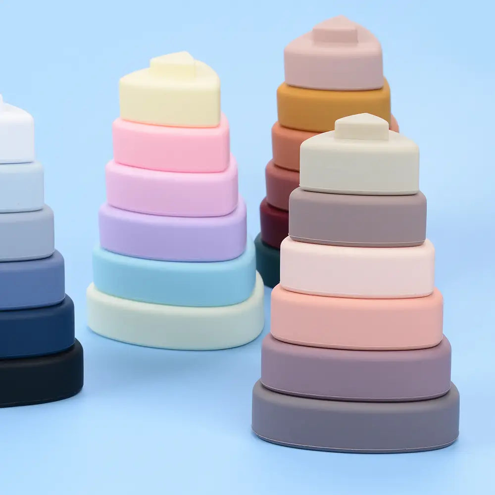 silicone stacking blocks pastel montessori toys featuring pastel-colored silicone stacking rings in soft hues of pink blue and beige