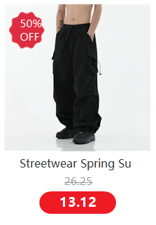 Black mens tactical cargo pants with elastic waistband and side pockets suitable for streetwear.