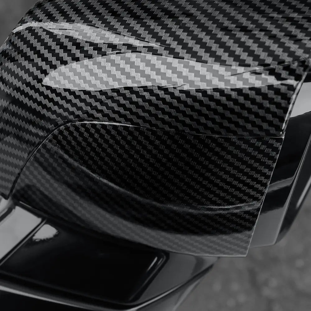 Hyundai Palisade led mirror covers 2020-2025 with a black carbon fiber textured surface featuring a glossy finish and a subtle gray weave pattern.