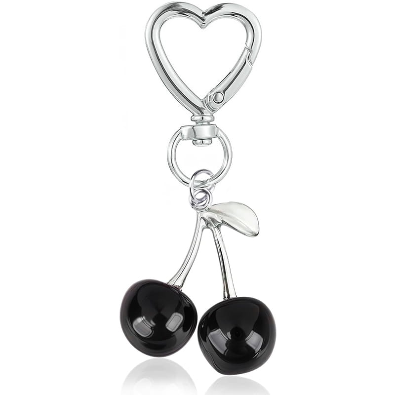 Silver heart-shaped keychain featuring two glossy black cherry charms with a small leaf accent as a cherry bag charm heart keychain.