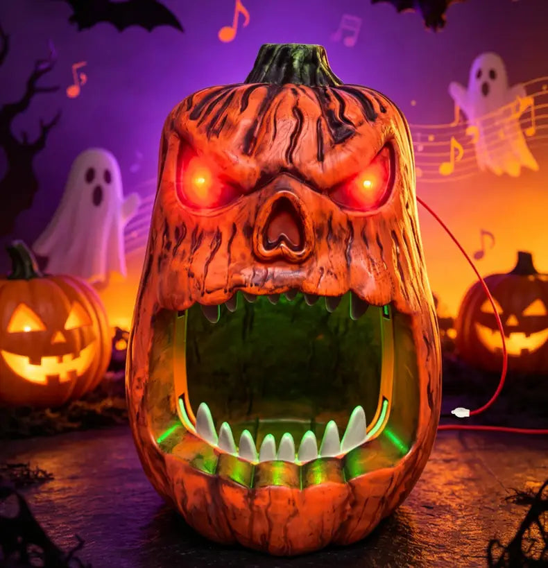una caja de almacenamiento para caramelos con calavera de calabaza de Halloween naranja y de aspecto siniestro, con ojos rojos brillantes y luces LED verdes que iluminan dientes blancos afilados