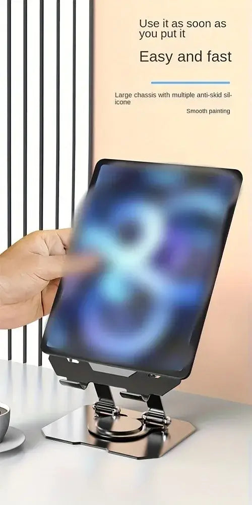 Support de tablette métallique noir avec fonction réglable et rotation à 360°, base en silicone antidérapant, dans un design moderne et épuré.
