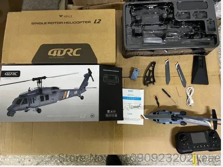 Gray and black qdrc l2 single rotor remote control helicopter model with 8k camera featuring detailed markings, displayed alongside its remote control and accessories.