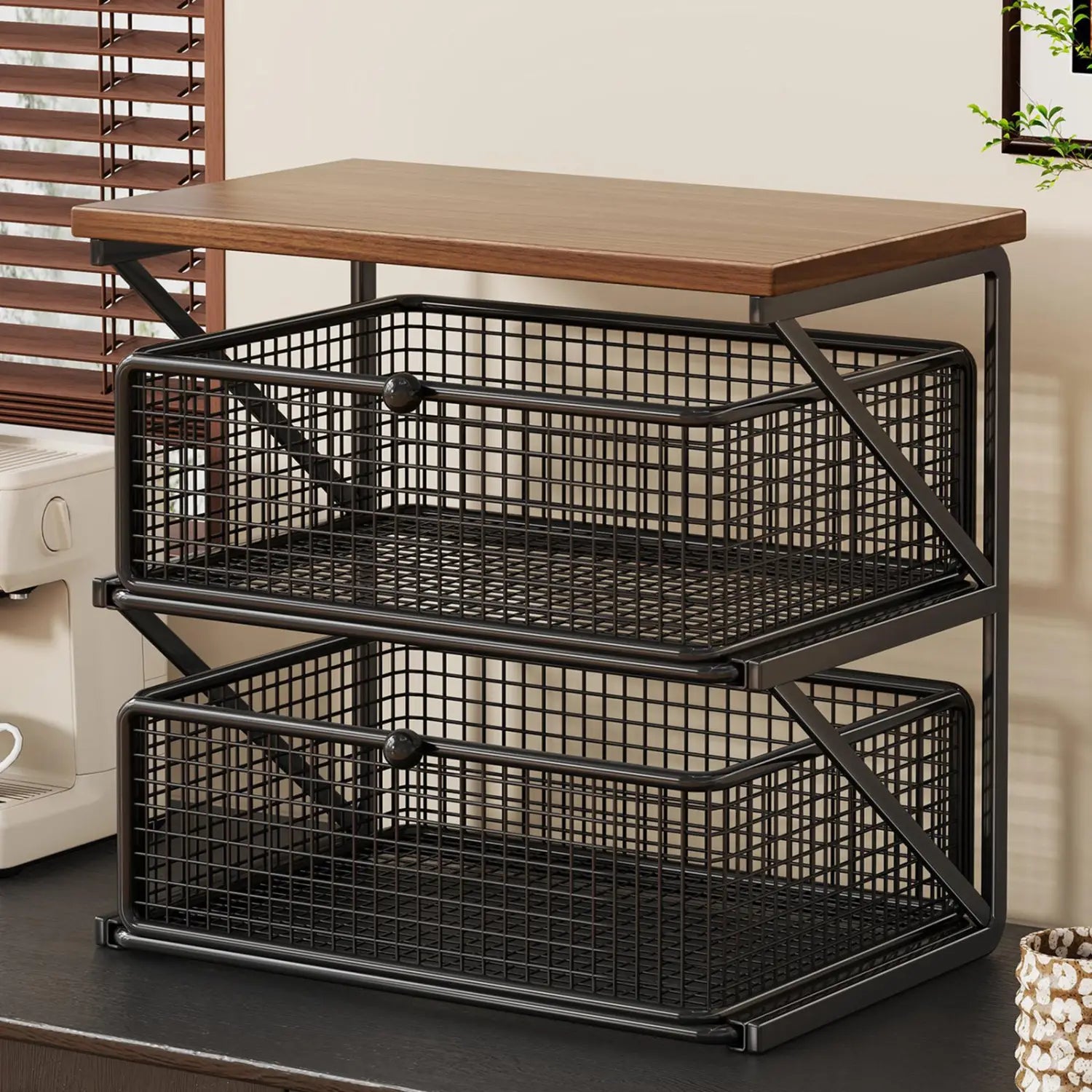 Black metal mesh station organizer with two tiered baskets and wooden counter shelf for coffee station use.