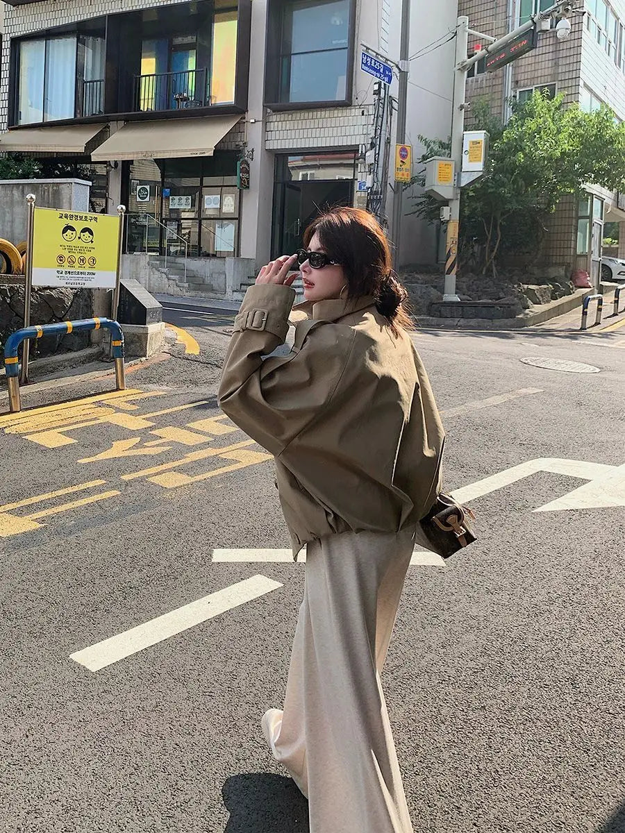 Women Korean trench coat beige utility jacket in tan with wide sleeves and a belted waist.