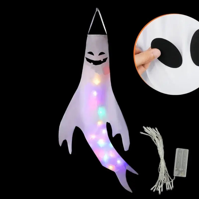 A translucent white halloween ghost led hanging windsock with a smiling face and colorful lights designed for home outdoor decoration.
