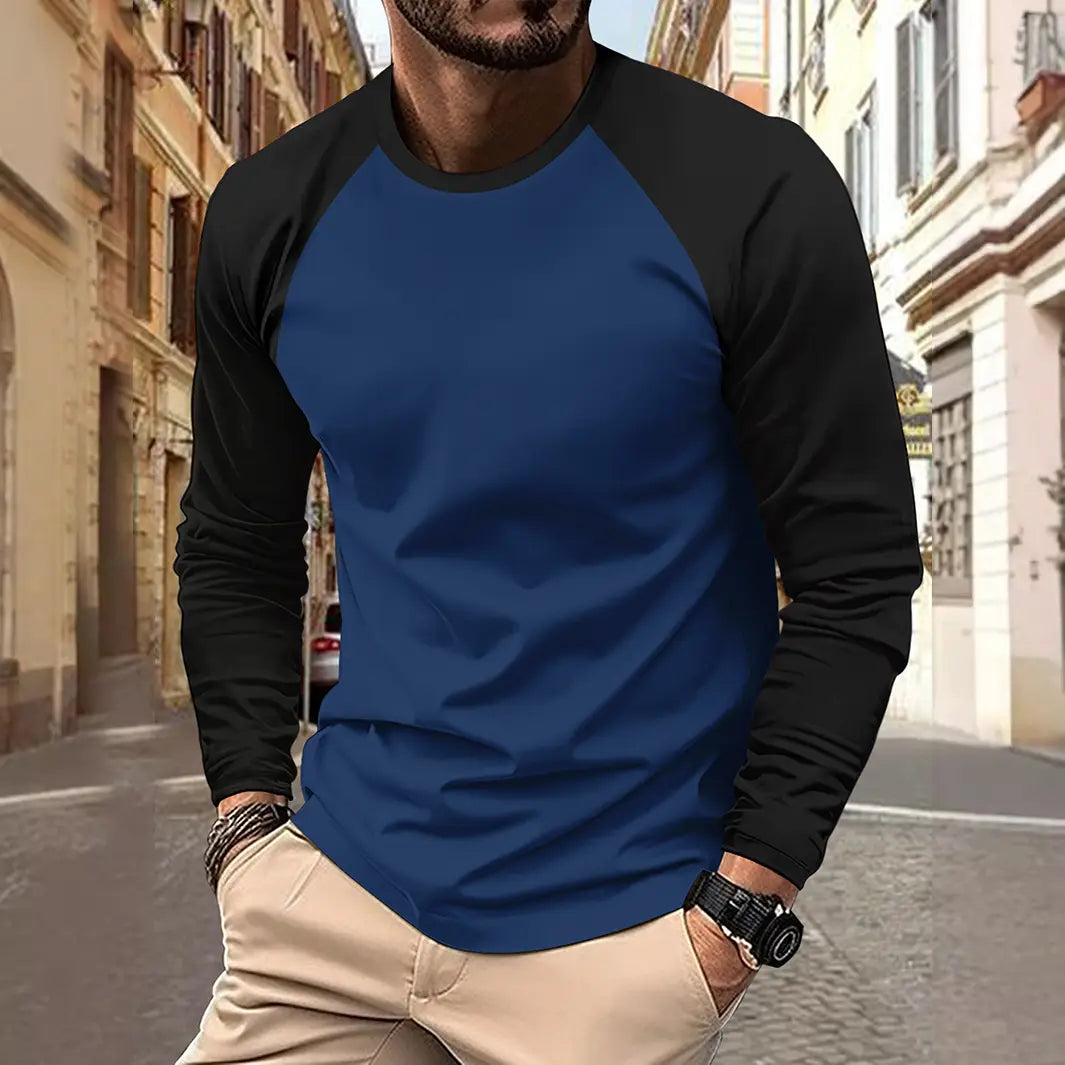 T-shirt raglan à manches longues bleu et noir avec encolure ronde, conçu comme un haut de printemps décontracté pour homme.
